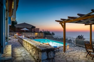 facilities blue chill villa pool at sunset